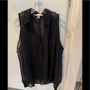 Sheer black open shoulder top.